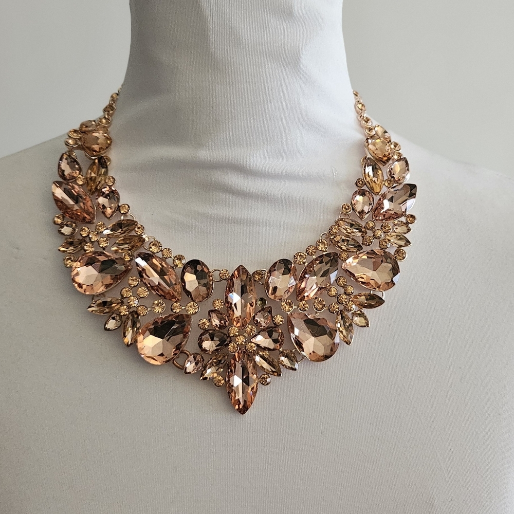 Rhinestone statement necklace in peach golden